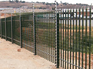 Palisade and electric fencing installation